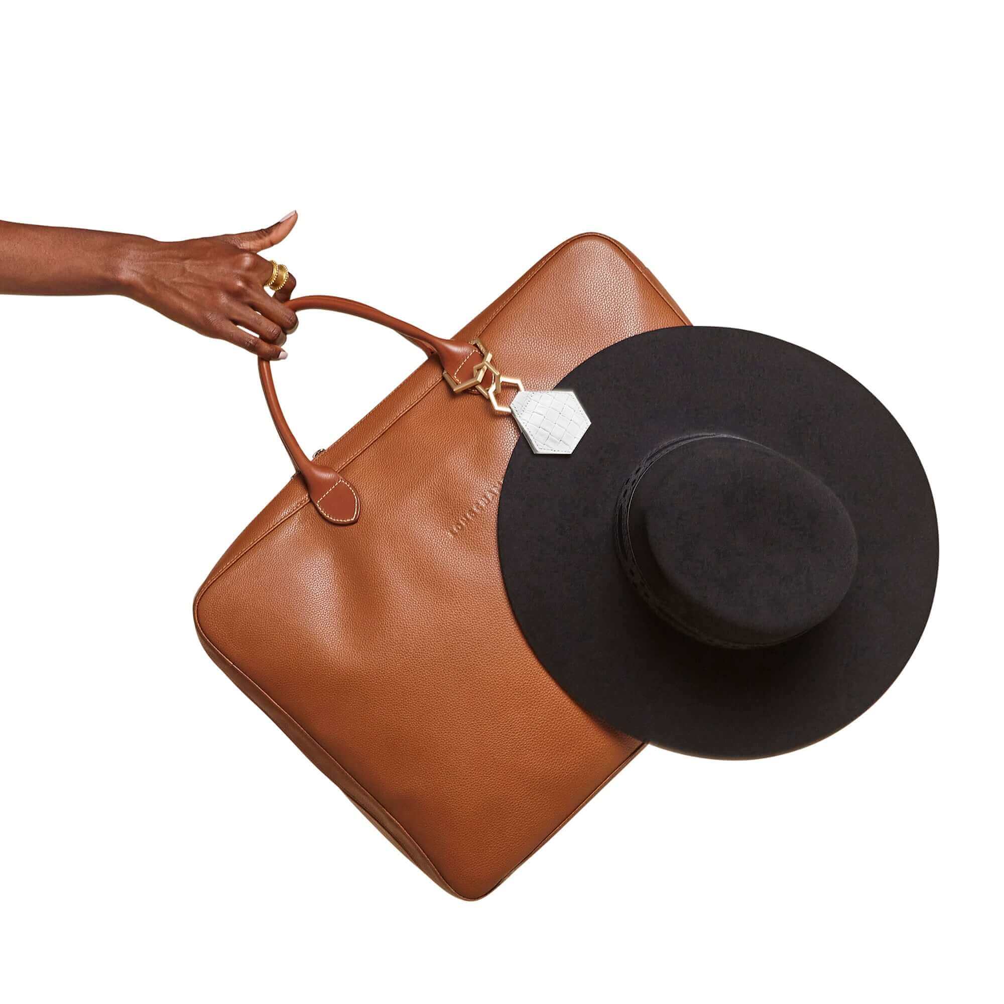 brushed gold hexagon hardware connected to TOPTOTE by Lindsay albanese hat clip