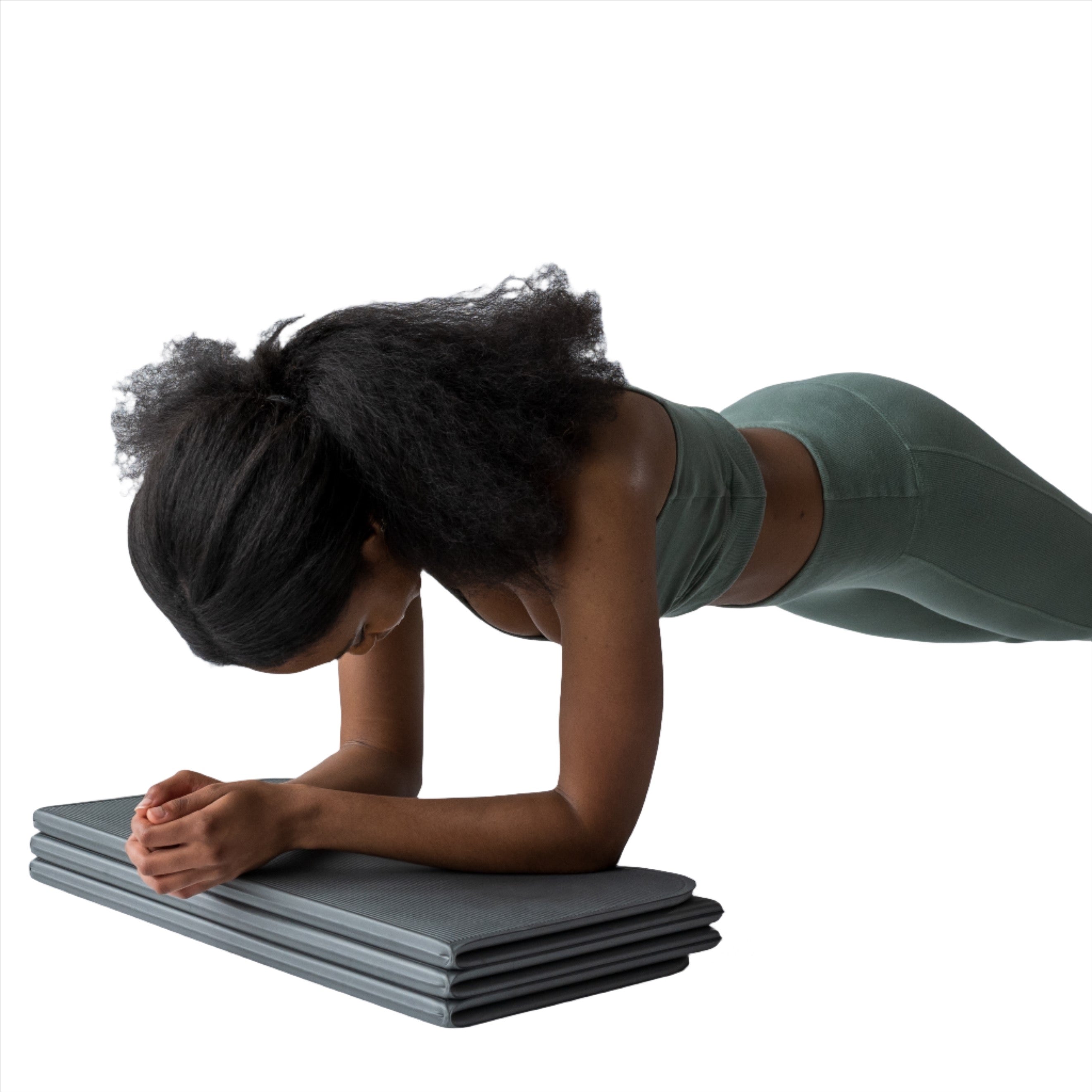 STAKT foldable yoga mat using as a block to in plank position