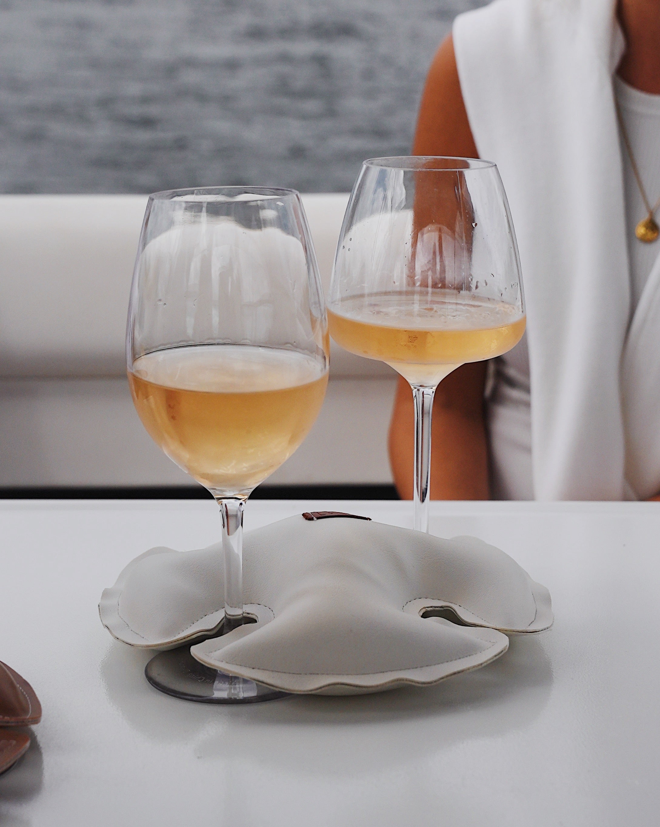 2 wine glasses secured with Classic Cloud LAGO, the premium stabilizer.