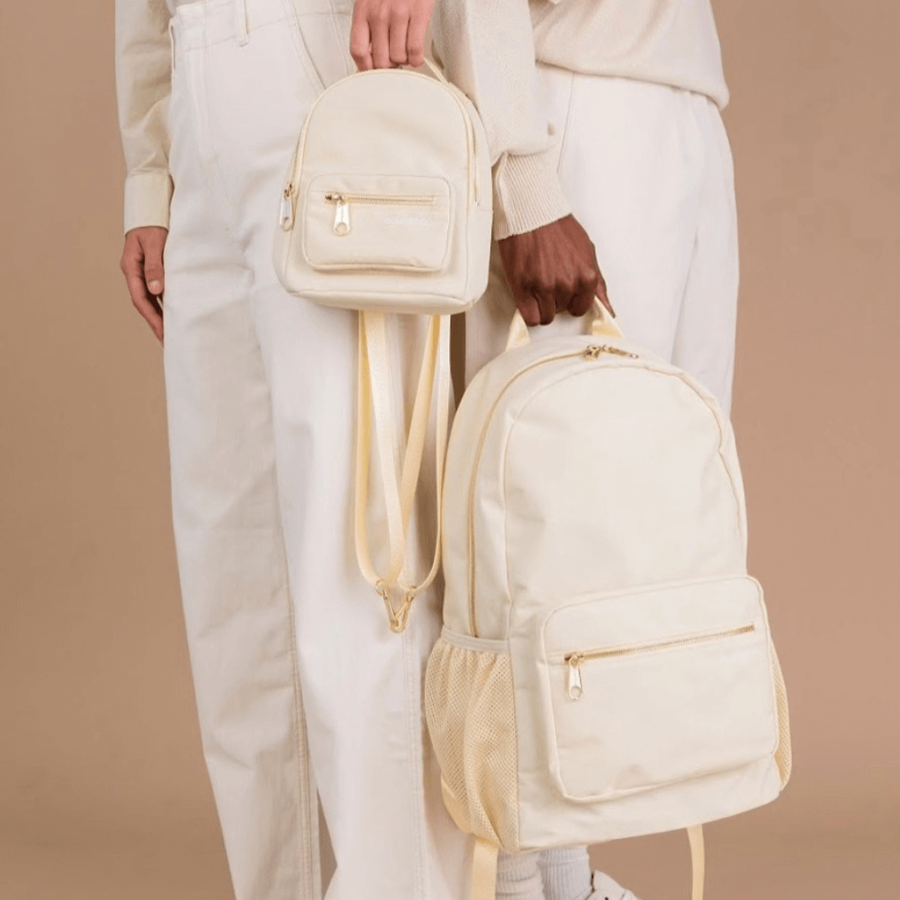 the augustnoa backpack in ivory with gold hardware and multiple pockets sold on the fileist marketplace