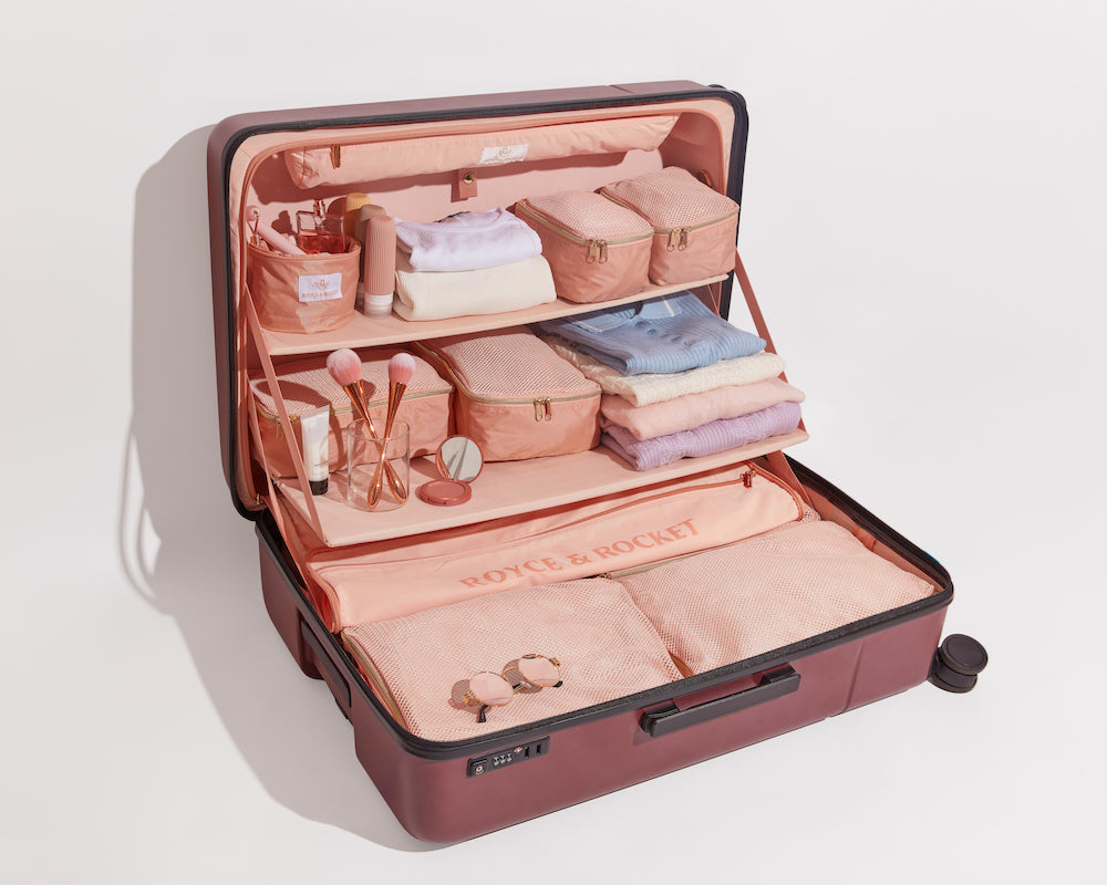 royce and socket suitcase with packing cubes and shelves