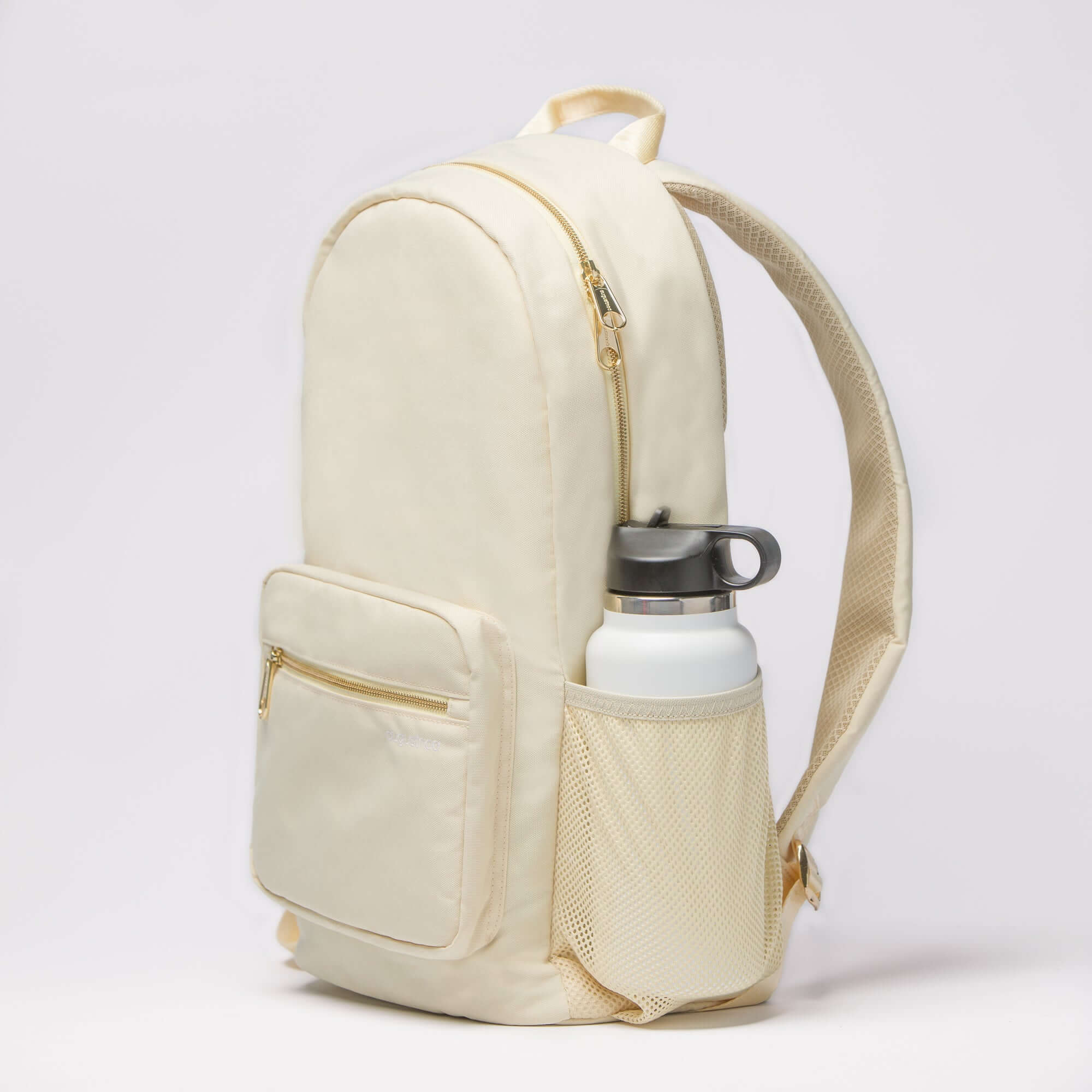 cream backpack made from recycled materials with gold hardware and lots of pockets including a laptop sleeve and trolley sleeve for your suitcase
