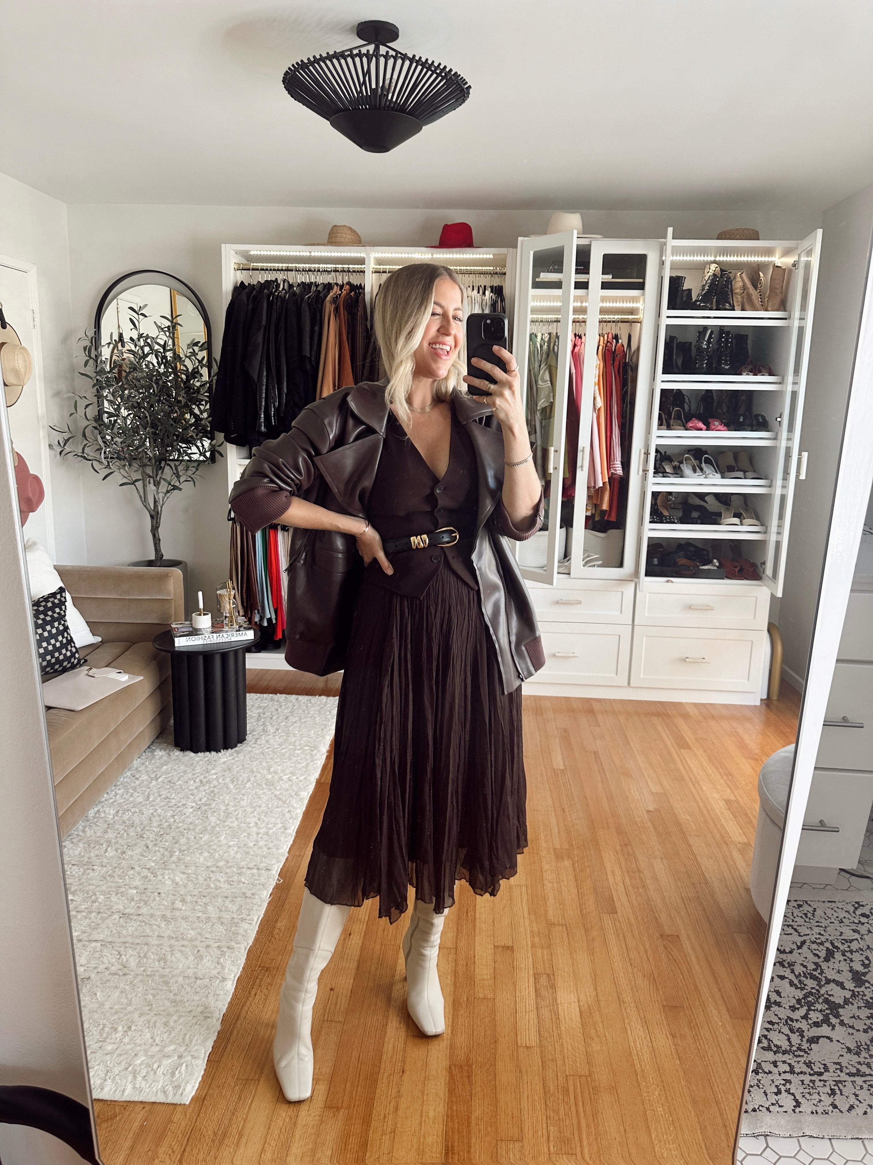 lindsay albanese wearing an all brown monochromatic outfit with cream tony bianco boots