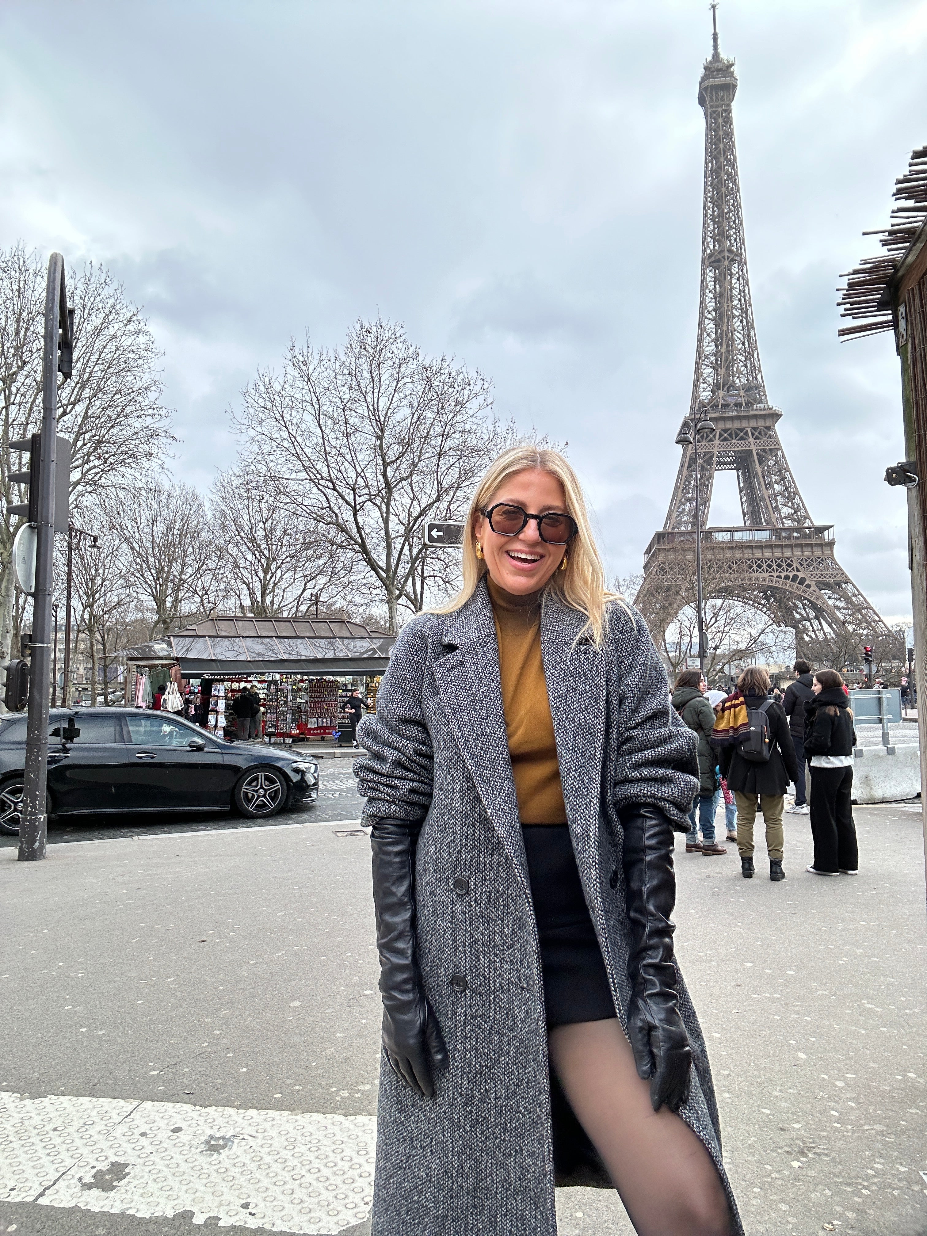 inventor and founder lindsay albanese in paris wearing an aritzia coat and leather gloves