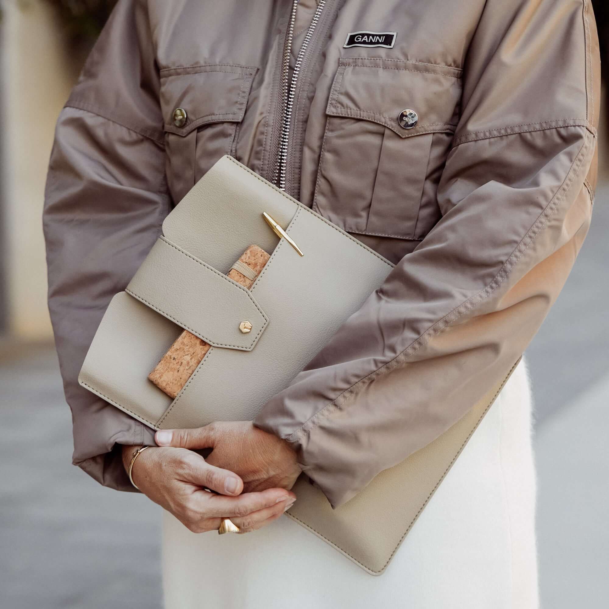 Lindsay Albanese laptop sleeve with front pocket and gold hardware in faux leather